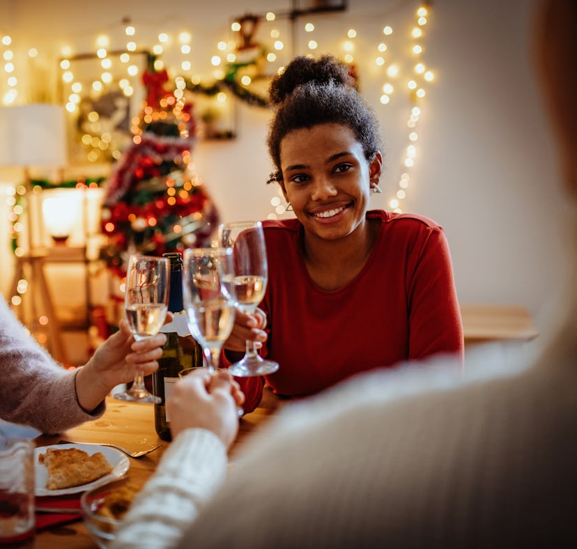 Three friends celebrate the holidays by posting pics with champagne captions for Instagram.