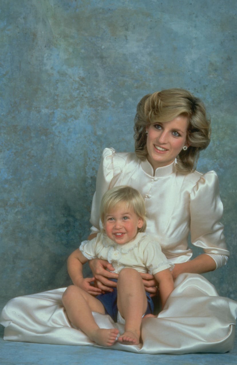Prince William poses for a portrait with his mom Princess Diana in 1984.