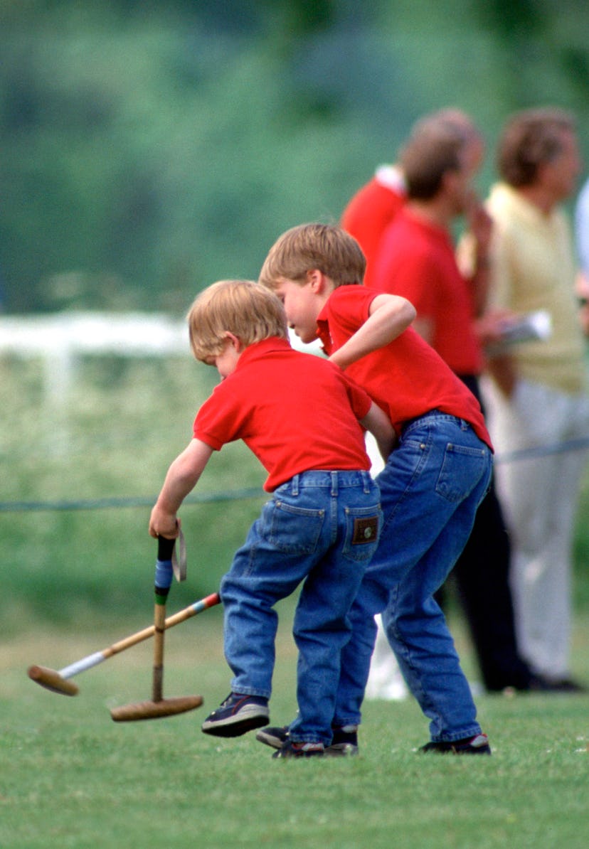 Prince William plays his own version of polo in 1990.