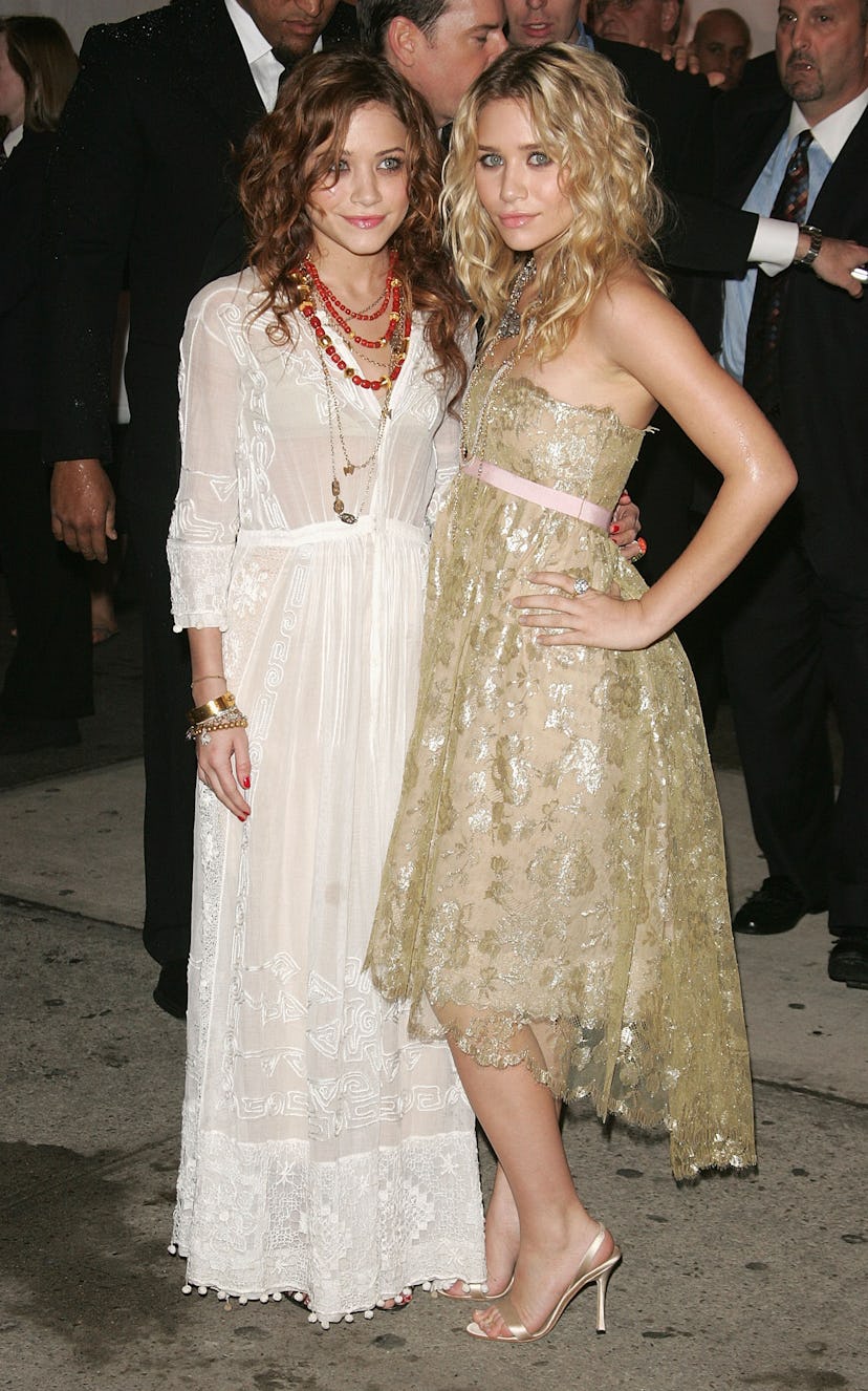 Actresses Mary Kate Olsen (L) and Ashley Olsen attend the MET Costume Institute Gala Celebrating Cha...