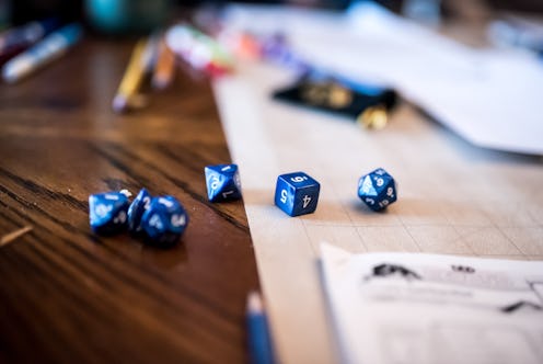 Various multi-sided dice in a dungeons and dragons game. How to play dungeons & dragons on zoom onli...