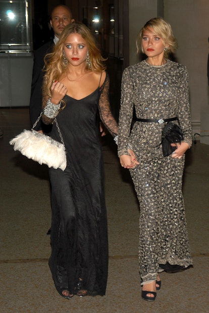 Mary-Kate Olsen and Ashley Olsen attend THE METROPOLITAN MUSEUM OF ART Costume Institute Spring 2006...