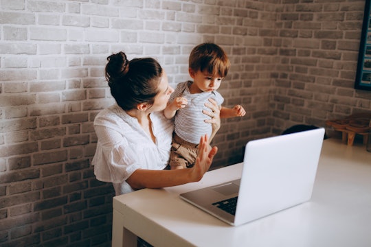 woman and baby with laptop