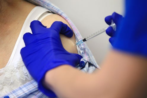 A person receives a COVID-19 vaccine. Here's why you can't choose which kind of COVID-19 vaccine you...