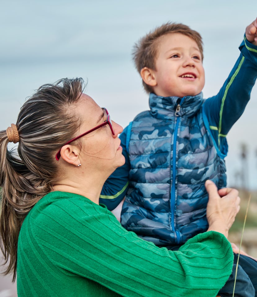 mother with child on beach