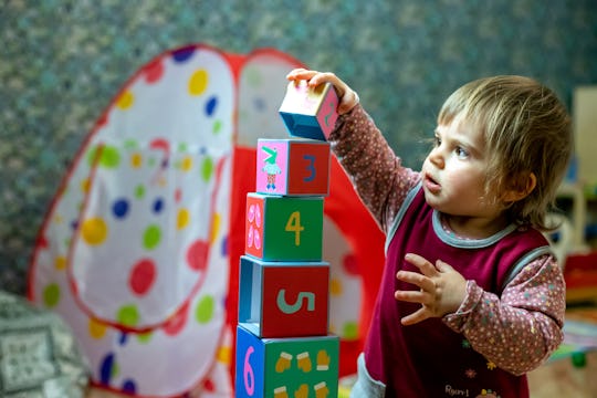 baby stacking number blocks