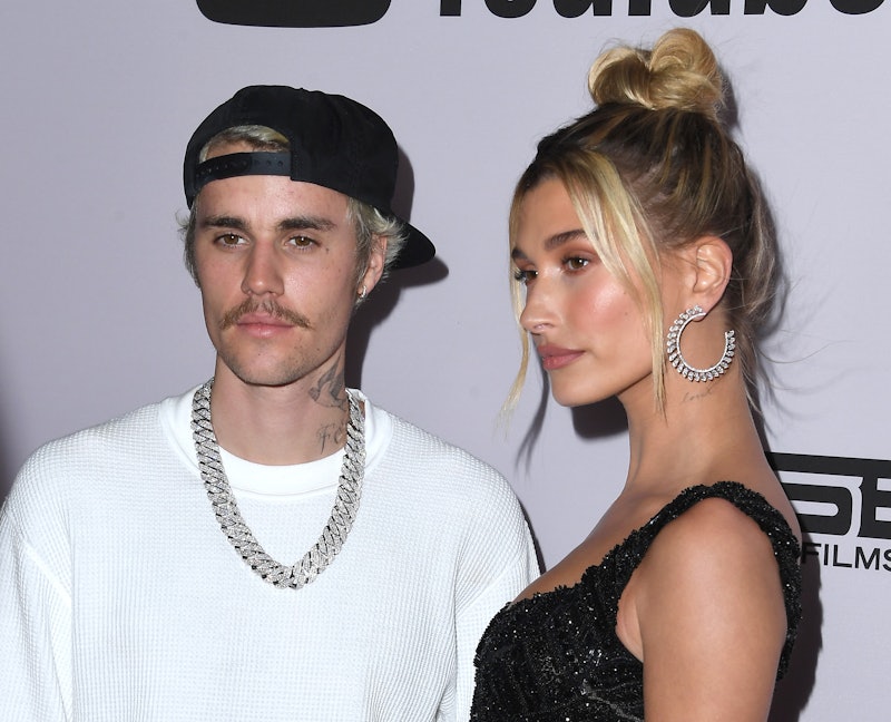 Justin Bieber defended his wife Hailey from an angry "Jelena" fan on Instagram.