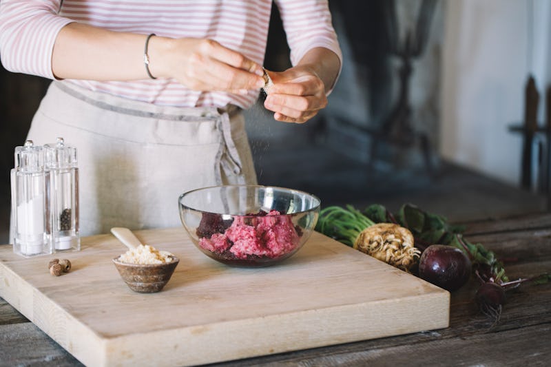 A woman bakes with nutmeg, a spice with a host of health benefits.