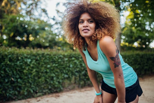A woman goes for a run in the park. Exercising is just one way to protect your heart health in your ...