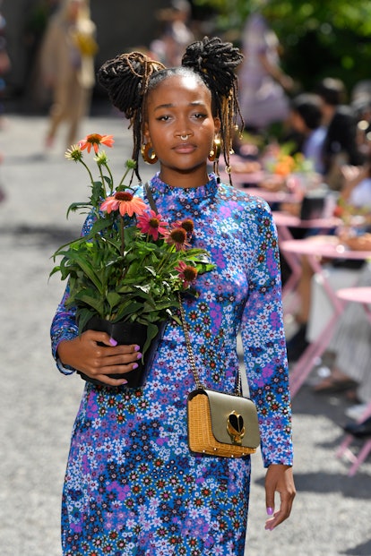 A model at the Kate Spade Spring 2020 fashion show rocks the floral, wallpaper print trend.