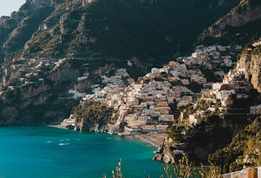 Positano, Italy and its colorful architecture are tucked into the Italian coastline. 