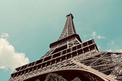 The Eiffel Tower in Paris stands tall on a sunny day.