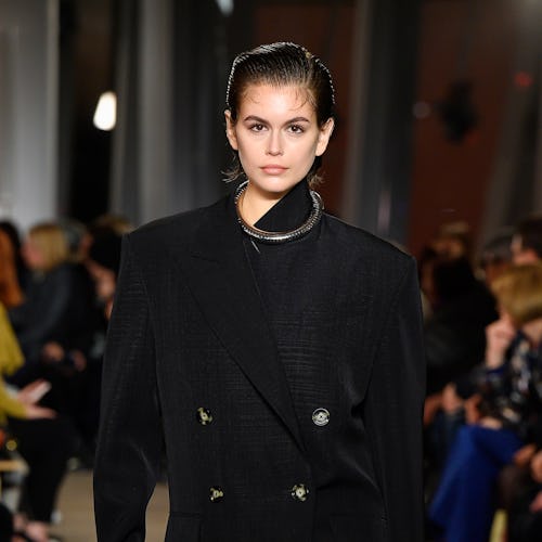 A model walking the runway in a look featuring an element of asymmetric styling from Proenza Schoule...