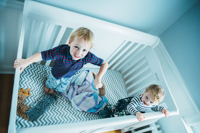 Keeping siblings in different rooms may keep your toddler from climbing out of a crib.