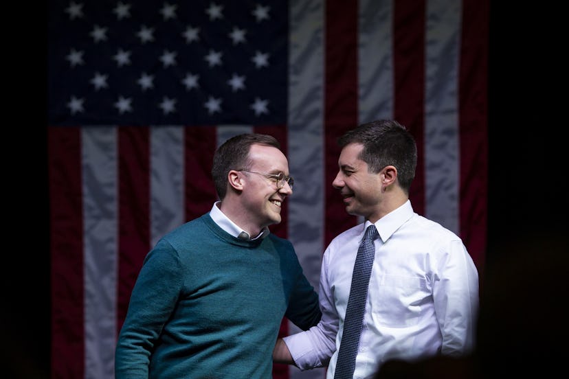 South Bend, Indiana Mayor Pete Buttigieg shares a smile with his husband during a campaign event. 