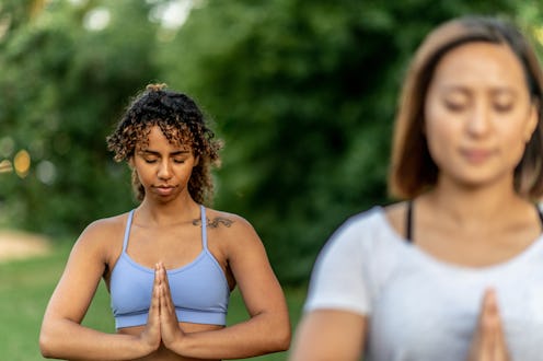 A woman does yoga. Breath work, which encompasses a wide range of breathing techniques, has attracte...