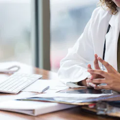 A doctor at their office. Being body-shamed at the doctor's is a common experience for people of a h...