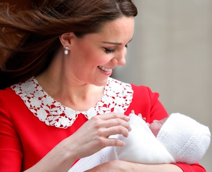 Kate Middleton cradles a newborn Prince Louis outside St. Mary's Hospital in Paddington, London, in ...