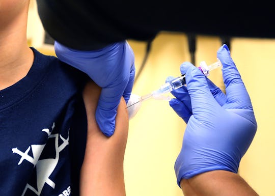 someone getting their flu shot