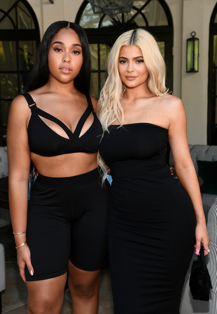 Kylie Jenner and Jordyn Woods rock head to toe black ensembles.