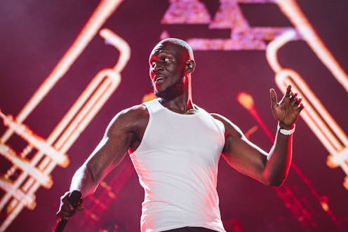 British rapper Stormzy during his concert in a white undershirt