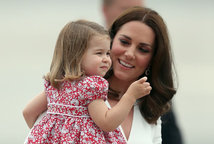 In a rarely personal interview, Kate Middleton revealed why a photo of Princess Charlotte smelling a...