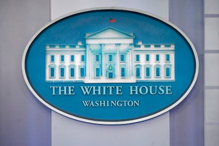 The White House logo is displayed in the press briefing room of the White House in Washington, D.C. ...