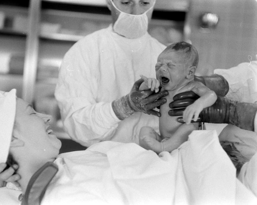 Vintage maternity ward photos show how much motherhood remains the same over time.