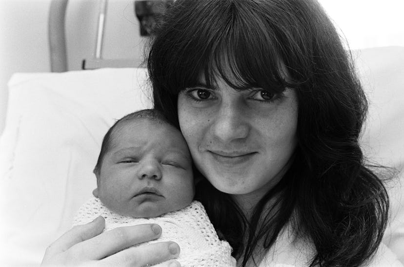 A 1975 portrait of a brand new mom and her brand new baby is just darling.