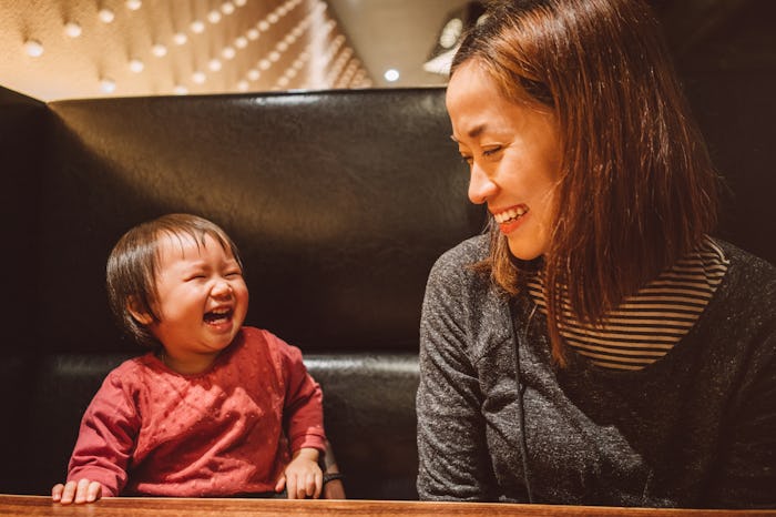 baby laughing at mom