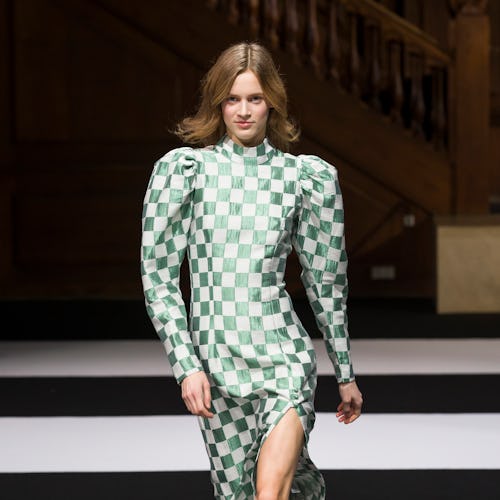 Model wears ROTATE's mint-and-white, green checkered dress at Copenhagen Fashion Week