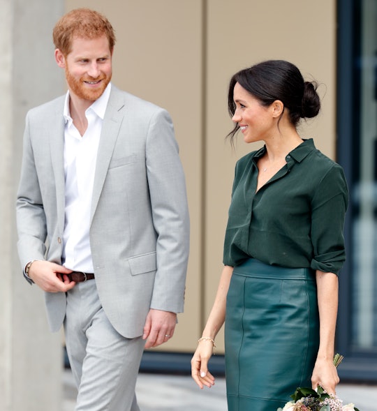 A video compilation of Prince Harry fixing Meghan Markle's hair at royal events has gone viral on Tw...