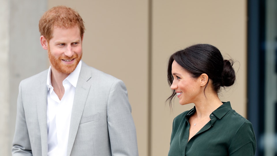 Viral Video Of Prince Harry Fixing Meghan Markle's Hair Will Make You Swoon