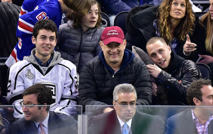 Tom Hanks was having a blast with his sons Chet and Truman at a hockey game in 2015.