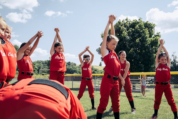 girls softball team at practice