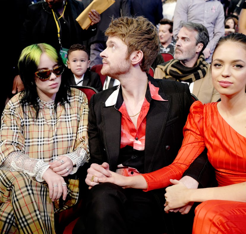 Billie Eilish, Finneas, and Claudia Sulewski pictured at the 2019 American Music Awards.