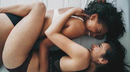 Two women prepare to have sex; the "number" of partners they've each had is totally irrelevant