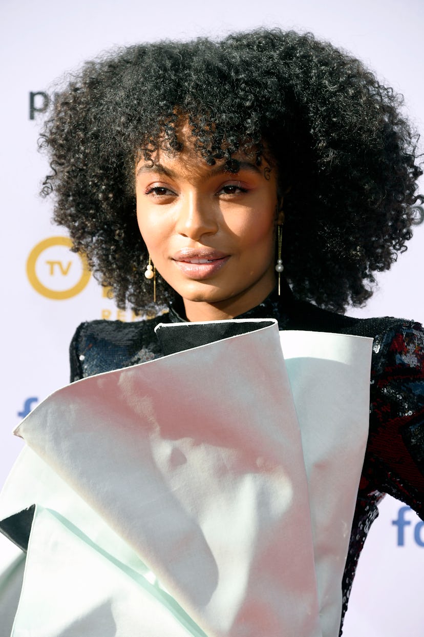 Yara Shahidi's curly bangs add even more oomph to her short, textured hair