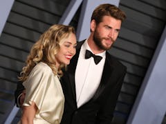 Miley Cyrus & Liam Hemsworth reportedly attended the same party ahead of the Oscars this Sunday.
