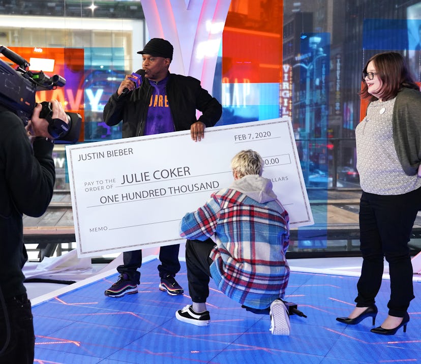 Justin Bieber surprised fan Julie Coker with a $100,000 check on MTV's 'Fresh Out Live.'