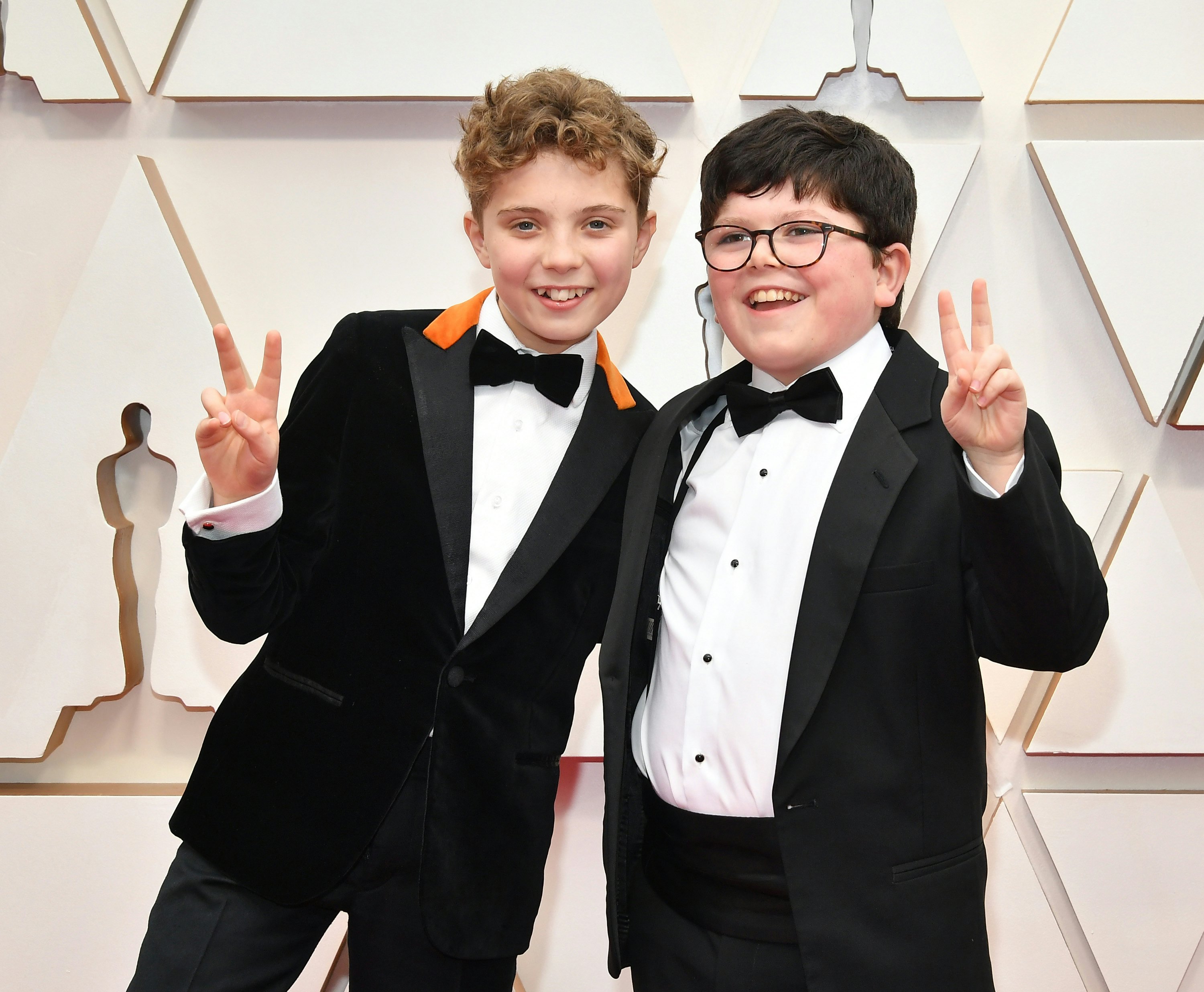 Roman Griffin Davis & Archie Yates Throw Up Peace Signs At The Oscars