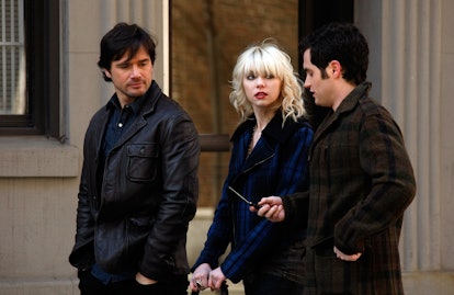 Taylor Momsen with bangs and a fringe hair cut in a blue plaid jacket.