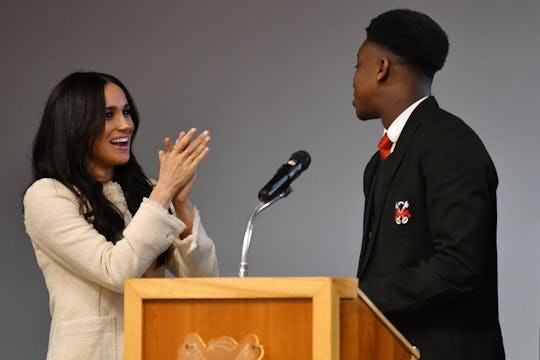 The teen who "cuddled" Meghan Markle is apologizing to Prince Harry