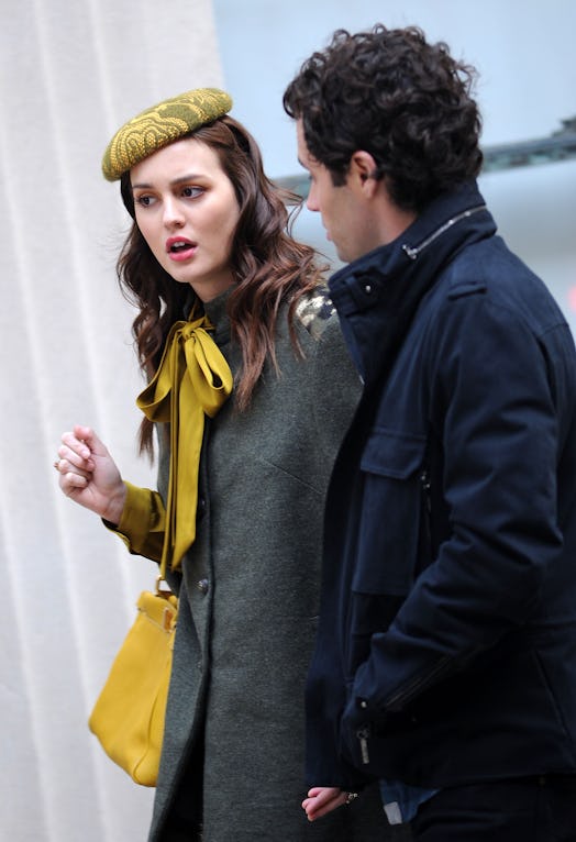Leighton Meester wears a yellow beret on top of her curled hair