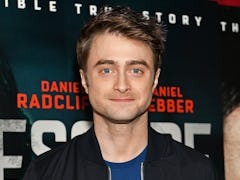 Daniel Radcliffe attends a movie premiere.