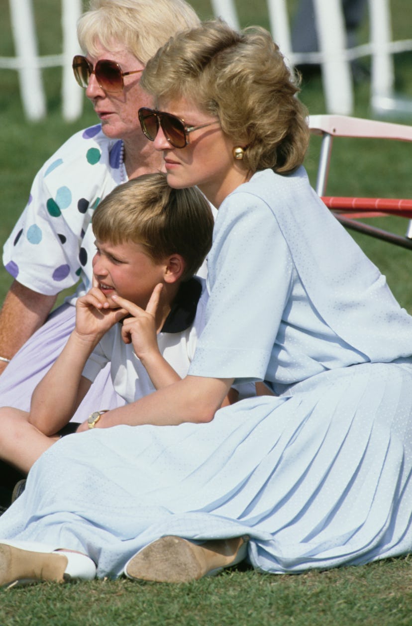 Princess Diana holds Prince George