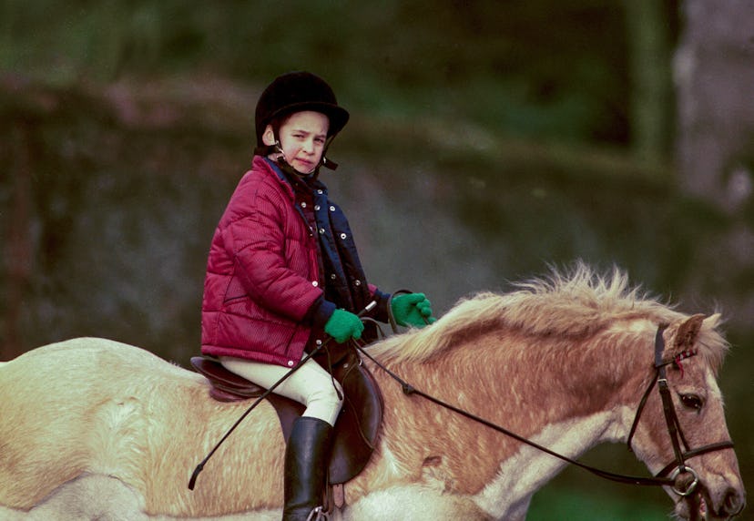 Prince William rides a horse