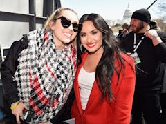 Miley Cyrus and Demi Lovato pose for a snapshot.