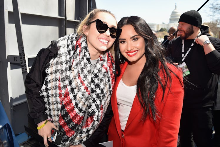 Miley Cyrus and Demi Lovato pose for a snapshot.