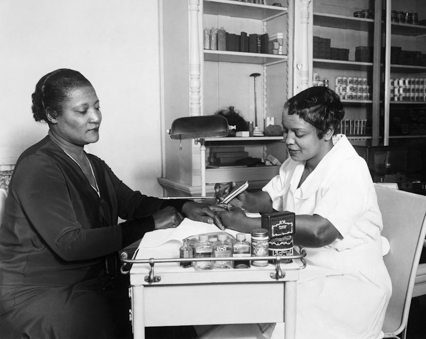 A'Lelia Walker, daughter of Madame C. J. Walker, gets a manicure at one of her mother's beauty shops